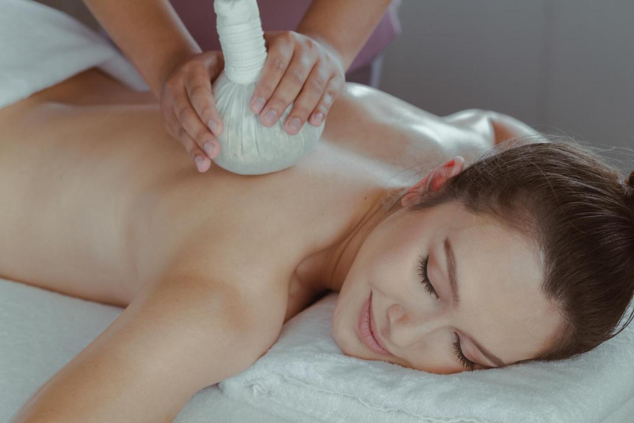 Amatara Welleisure Resort Cape Panwa Bagian luar foto Thai herbal compress massage