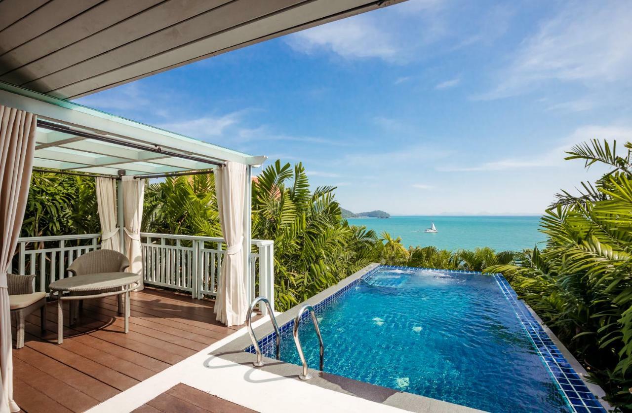 Amatara Welleisure Resort Cape Panwa Bagian luar foto A pool at the resort